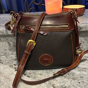 Dooney and Bourke All weather 3.0 leather zip top bag